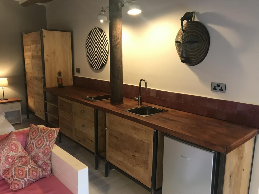 Pili Pili Boutique Hotel Кигали Стая снимка