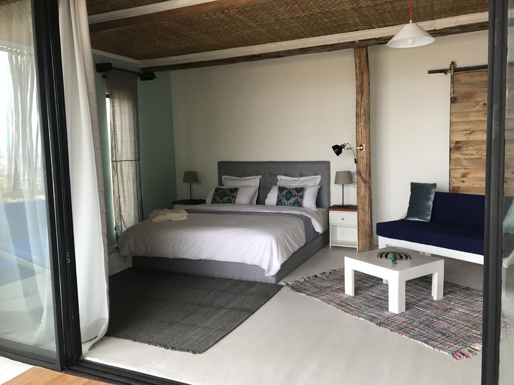 Pili Pili Boutique Hotel Кигали Екстериор снимка