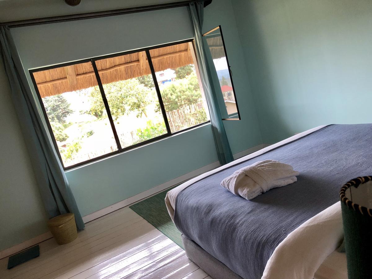 Pili Pili Boutique Hotel Кигали Екстериор снимка