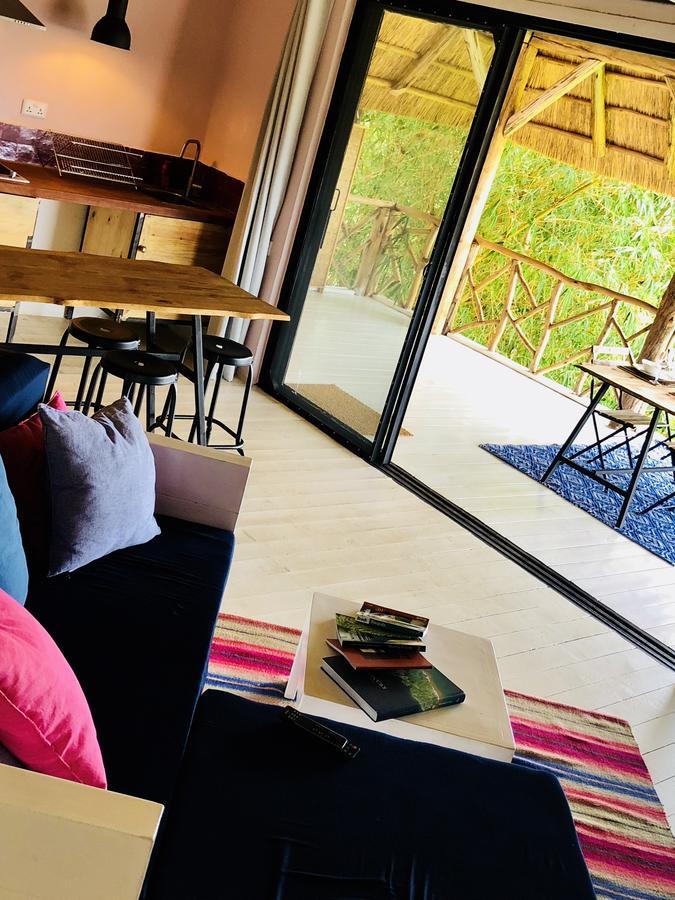 Pili Pili Boutique Hotel Кигали Екстериор снимка